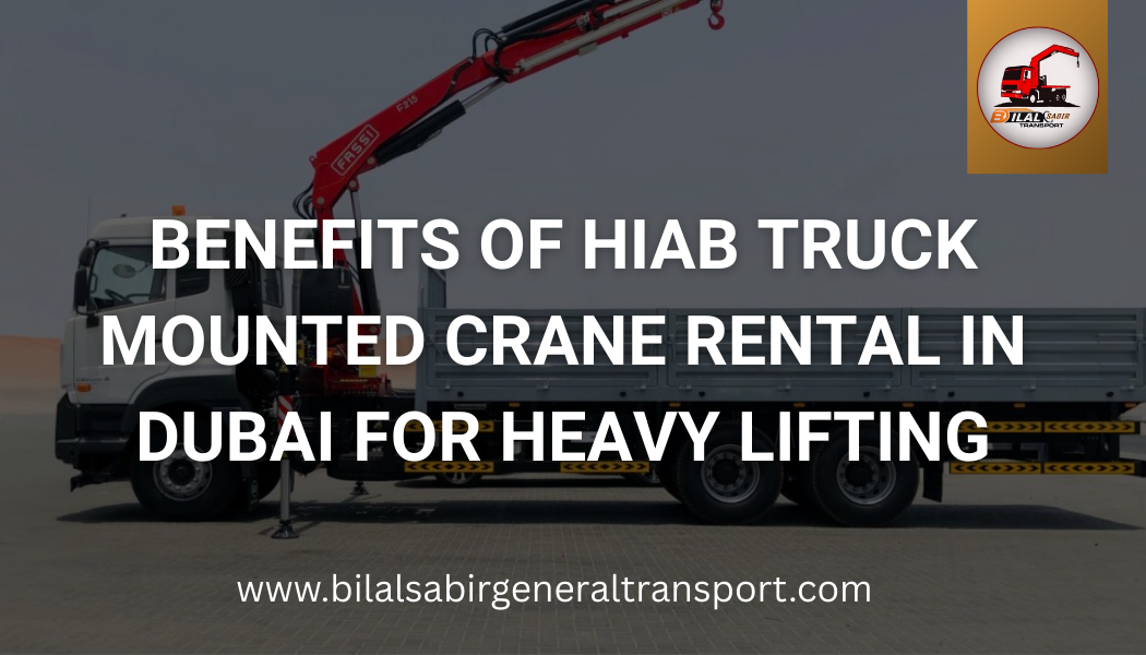 Hiab truck mounted crane lifting heavy materials on a construction site in Dubai